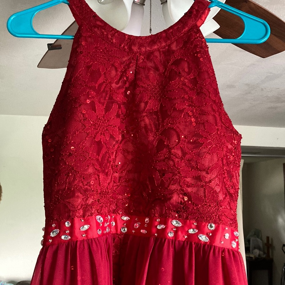 Girls size 16 romper dress with embellishments.